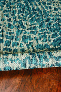 63" X 91" Teal Polypropylene Rug