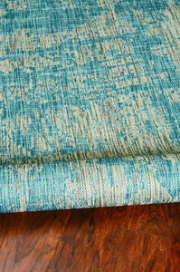 63" X 91" Teal Polypropylene Rug